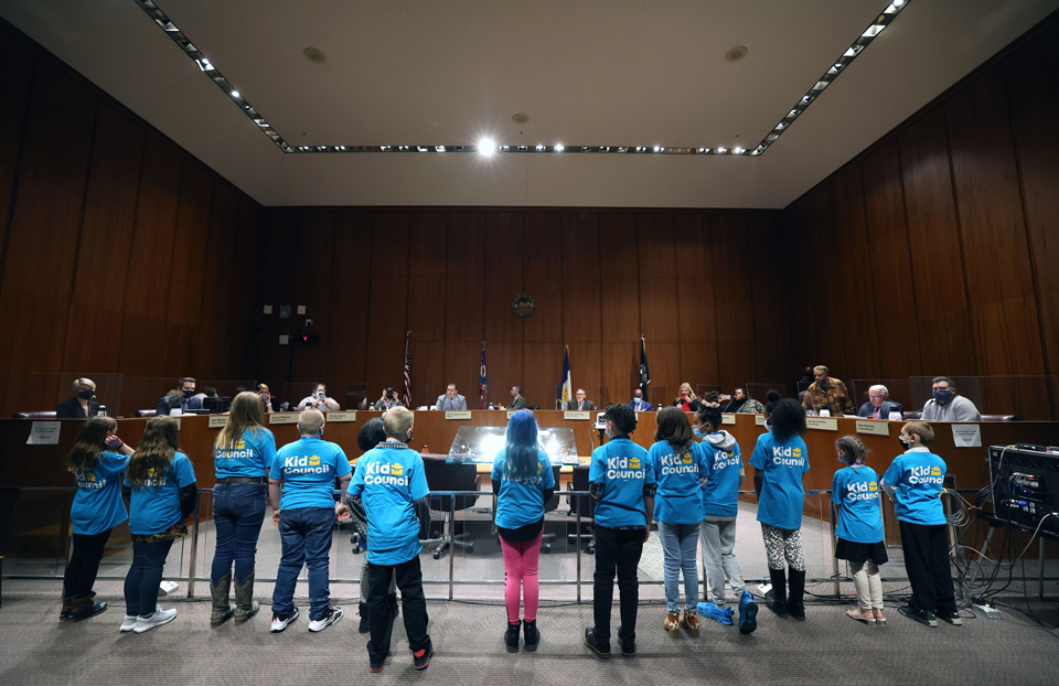 Kid Council and Mayor stand before City Council