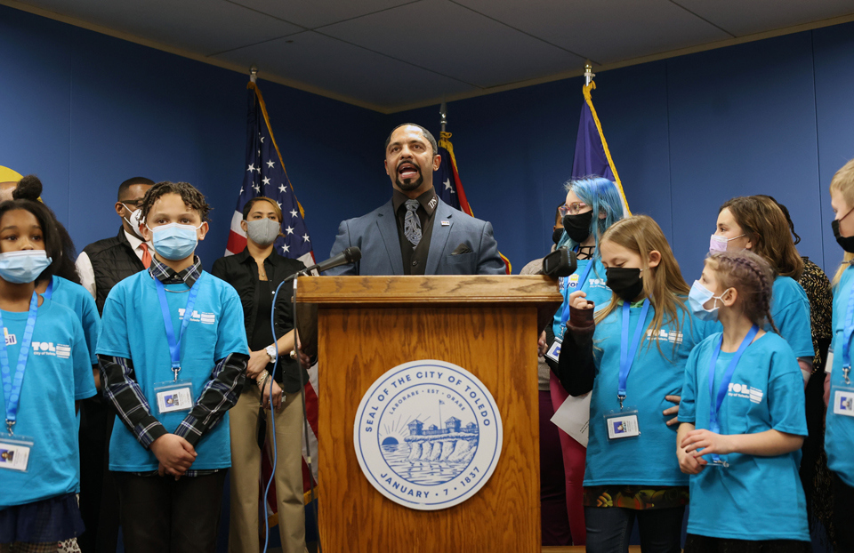 Toledo Public Schools Superintendent Romulus Durant speaks alongside kids.
